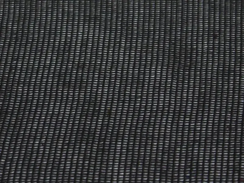 Black sharkstooth gauze close up, showing its open ladder weave